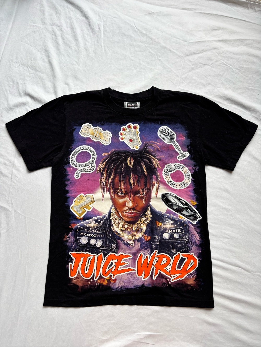 The Roxx Black Graphic Tee with Purple and Orange Print